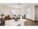 Inviting living room featuring a neutral color palette, stylish furniture, and ample natural light at 2370 S Ogden St, Denver, CO 80210