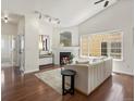 Bright and spacious living room with a fireplace and hardwood floors at 12335 E 2Nd Dr, Aurora, CO 80011