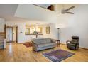 Bright living room with hardwood floors, vaulted ceiling and fireplace at 2938 Kalmia Ave # 6, Boulder, CO 80301