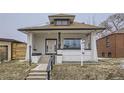 Charming front exterior of a two-story home with a front porch, steps, and a 'for sale' sign at 3532 N Vine St, Denver, CO 80205