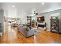 Spacious living room with hardwood floors, modern decor, and lots of natural light at 4220 Quitman St, Denver, CO 80212