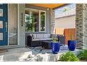 Inviting porch with comfortable seating, perfect for enjoying a relaxing day outdoors at 4220 Quitman St, Denver, CO 80212