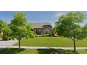 Beautiful home with a well manicured lawn and mature trees at 16550 Antero Cir, Broomfield, CO 80023