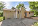 Charming single-story home with an attached garage and cozy curb appeal at 6396 Twin Lakes Rd, Boulder, CO 80301