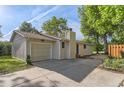 Charming single-story home with an attached garage and cozy curb appeal at 6396 Twin Lakes Rd, Boulder, CO 80301