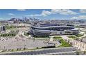 Aerial shot of Empower Field at Mile High, with downtown Denver and the surrounding cityscape at 3031 W 20Th Ave, Denver, CO 80211