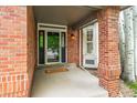 Inviting front porch with brick accents and a welcoming entrance at 2204 Lasalle St, Superior, CO 80027