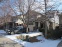 Attractive two-story home with stone accents, attached garage, and well-maintained landscaping in a suburban neighborhood at 7456 E 10Th Ave, Denver, CO 80230