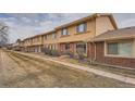 Charming townhome community with well-manicured lawns offering comfortable and convenient living at 12407 E Louisiana Ave, Aurora, CO 80012
