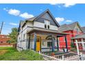 Attractive home exterior with a well-maintained yard, inviting porch, and charming architectural details at 274 S Lincoln St, Denver, CO 80209