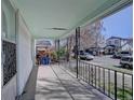 Inviting covered front porch, perfect for relaxing and enjoying the neighborhood views at 2963 S Lincoln St, Englewood, CO 80113