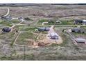 Sprawling community with expansive lots, featuring large, modern homes, gravel roads and stunning views at 6957 Black Forest Dr, Elizabeth, CO 80107