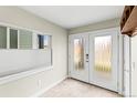 Inviting entryway features tiled floor and frosted glass door at 3220 W 20Th Ave # 1, Denver, CO 80211