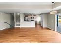 Spacious open-concept living room with beautiful hardwood floors at 3220 W 20Th Ave # 1, Denver, CO 80211