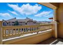 Bright balcony view showcasing the architecture and surrounding landscape on a sunny day at 9557 W San Juan Cir # 306, Littleton, CO 80128