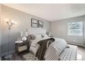Cozy bedroom featuring a plush bed, soft lighting, and elegant decor at 451 Golden Cir # 210, Golden, CO 80401