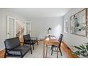 Bright office space with hardwood floors, white walls, and natural light at 2432 S Columbine St, Denver, CO 80210
