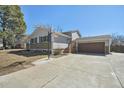 This lovely home includes an attached garage and a driveway with room to play basketball at 16622 E Asbury Ave, Aurora, CO 80013