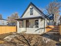 Newly remodeled craftsman home with a fresh coat of paint and updated landscaping at 3120 N Race St, Denver, CO 80205