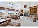 Cozy living room featuring a fireplace and carpet at 4405 Fairway Ln, Broomfield, CO 80023
