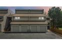 Townhome with attached garages offers convenience and curb appeal at 10550 W Jewell Ave # 301, Lakewood, CO 80232