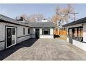 Spacious backyard featuring large concrete patio perfect for entertaining at 1248 Ursula St, Aurora, CO 80011