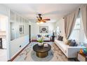 Modern living room featuring hardwood floors, plush seating, and stylish decor at 2205 S King St, Denver, CO 80219