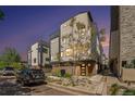 Modern townhouse exterior with contemporary design and professional landscaping under a twilight sky at 5610 S Sycamore St, Littleton, CO 80120