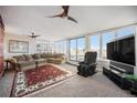 Spacious living room with city views, large windows, and comfortable seating at 1020 15Th St # 42C, Denver, CO 80202