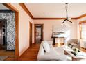 Light-filled living room with hardwood floors and neutral decor at 626 Fillmore St, Denver, CO 80206