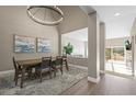 Elegant dining room with modern chandelier and open floor plan at 4204 Morning Star Dr, Castle Rock, CO 80108