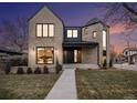 Stunning two-story home with brick exterior, nighttime view at 760 Jersey St, Denver, CO 80220