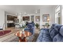 Living room with open floor plan and kitchen view at 15501 E 112Th Ave # 6F, Commerce City, CO 80022