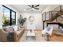 Light-filled living room with hardwood floors and a modern aesthetic at 1838 Pearl # C, Boulder, CO 80302