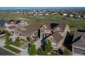 Beautiful aerial shot of a home with solar panels highlighting its prime location in the neighborhood at 8761 S Wenatchee Ct, Aurora, CO 80016