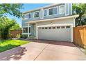 Beautiful two-story home with large windows and a two-car garage at 1526 Braewood Ave, Littleton, CO 80129
