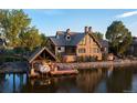 Beautiful waterfront home with private dock and boat lift, perfect for enjoying the lake at 9833 Shoreline Dr, Longmont, CO 80504