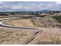 Exterior neighborhood street with new road and community landscaping at 4285 Ridgewalk Pt, Castle Rock, CO 80108