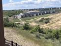 Beautiful community view with rolling hills and mountains in the distance at 4285 Ridgewalk Pt, Castle Rock, CO 80108