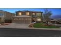 Charming two-story home with a two-car garage and professionally landscaped front yard at 9109 Ironwood Way, Highlands Ranch, CO 80129