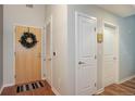 Inviting entryway features warm wood floors, neutral walls, and decorative accents, creating a welcoming atmosphere at 1700 Bassett St # 504, Denver, CO 80202