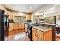 Bright kitchen with stainless steel appliances, wood cabinets and granite countertops at 200 Rachel Ln, Breckenridge, CO 80424