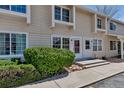 Well-maintained townhouse exterior with a landscaped front yard and inviting entrance at 8905 Field St # 91, Westminster, CO 80021