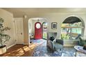 Bright and spacious entryway with access to the living room at 1303 Newport St, Denver, CO 80220