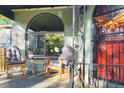 Inviting front porch with rocking chairs, perfect for relaxing at 1303 Newport St, Denver, CO 80220
