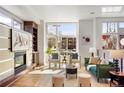 Inviting living room with ample natural light, a cozy seating area, and contemporary decor for a relaxing ambiance at 2518 N Washington St, Denver, CO 80205