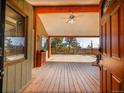 Step onto this spacious outdoor deck, perfect for entertaining and enjoying breathtaking mountain views at 312 Meadow View Dr, Evergreen, CO 80439