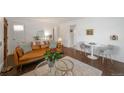 Inviting living room with hardwood floors, modern decor, and lots of natural light at 2080 Fulton St, Aurora, CO 80010