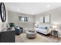 Cozy living room features modern decor, wood floors, and bright natural light at 16359 W 10Th Ave # T1, Golden, CO 80401