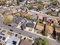 Neighborhood aerial shot featuring well-maintained homes, mature trees, and landscaped yards at 2433 E 90Th Ave, Thornton, CO 80229